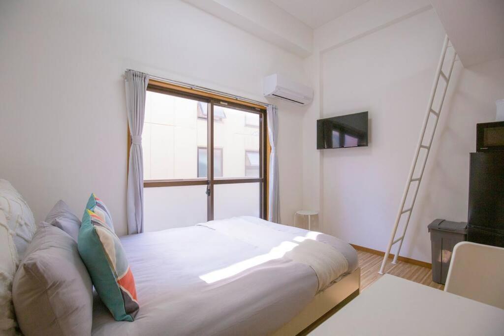閑静な住宅街_暖かく居心地の良いデザイン Yoy-6 東京都 エクステリア 写真